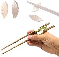 Using chopsticks is a practice of finding the perfect combination of balance and pressure to pick up your food, and this combination changes from one piece to the next. Amazon Com Training Chopstick Helper Holder Reusable Chopsticks Easy To Use For Adults Beginners Kids Seniors With Hand Cramps Stiff Arthritis And Disabled 2 Pairs Home Kitchen