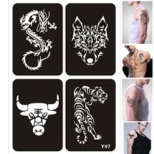 The above tattoo is about mid way henna tattoos often contain flora and natural designs such as flowers and ferns. 4 Designs Set Airbrush Glitter Tattoo Stencil Dragon Tiger Wolf Cow Diy Drawing Template Henna Tattoo Stencil Tattoo Pochoir Tattoo Stencils Aliexpress