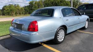 Image result for Light Ice Blue 2005 Town Car