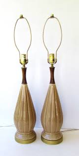 In addition to the light emitting from under the copper shade, there is an added etsy.com hemingway 42 glass insulator pendant w/solid copper shade, brass accents (ceiling canopy, vintage black rayon pulley cord & 60w bulb incl.) The 10 Best Etsy Shops For Vintage Lighting Apartment Therapy