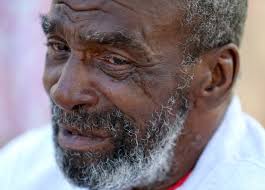 Homeless street salesman thought dead mobbed by fans at Lake Merritt