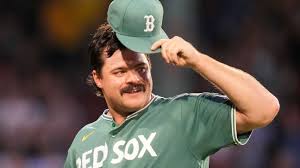 Payton Tolle pitching for the Boston Red Sox against the Athletics at Fenway Park