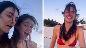 Kylie & Kendall Jenner in Bikinis Drunkenly Tossing Rocks Into Sea,