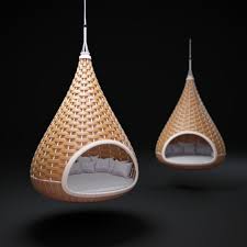 The colorful yarn hanging chair adds a pop of warm colors to the room, brightly accenting the blue. 10 Cool Modern Indoor Hanging Chairs Ideas And Designs Furniture Fashion