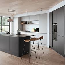 Featuring antique bronze mirrored splashback with 'rugged concrete' quartz worktops by caesarstone, and 'laurel oak'. Modern Kitchen Design Light Grey Novocom Top