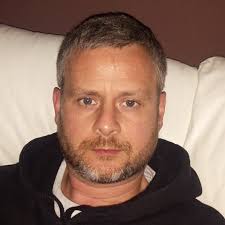 What is the most affordable wall material to put over insulation in a van?