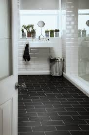 A popular bathroom flooring trend is installing radiant heat that provides a welcome alternative to cold, hard surfaces. Bathroom Black Marble Bathroom Bathrooms Polyflor At Home Plus Colonia Imperial Black Marble De Black Marble Bathroom Vinyl Flooring Bathroom Bathroom Flooring