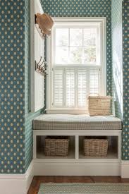 A light living room area with white linen couches and french doors that lead out into the garden. 20 Cozy Window Seat Ideas Inspiring Seating For Any Home