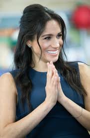 With a caucasian father and an african american mother, meghan knew early on that she looks different from most of her peers, even without plastic surgery. Meghan Markle S Half Up Half Down Hairstyle Is A Brand New One For The Royal Hello