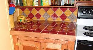 Tile counter with a borderstrip and bullnose tiles. Kitchen Counter Tile Options Networx