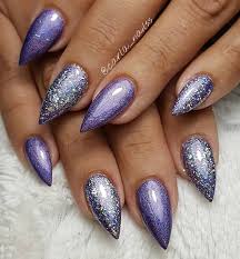 Every other nail is a matching glittery purple hue, with half the nails in a subtle shimmering purple and the others in a festive darker shade. 50 Gorgeous Purple Nail Ideas And Designs To Inspire You In 2020