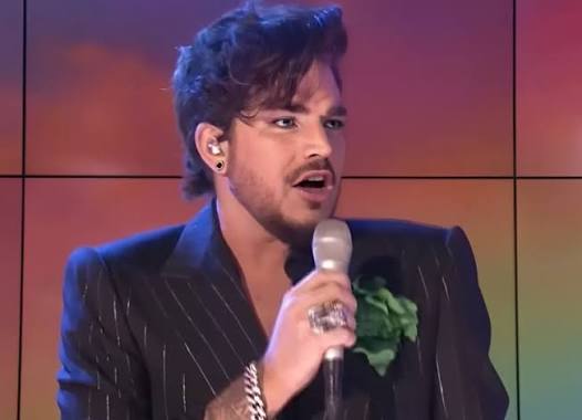 Adam Lambert rocked the YouTube Space in New York with an unforgettable performance of Queen's hit "I Want to Break Free." Adam hit the stage in flashy silver platform boots and a
