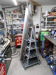 This rolling clamp rack holds about 50 clamps, takes up around four square feet and can be built in an afternoon. Homemade Rolling Storage Rack Homemadetools Net