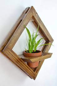 Find the perfect decorative accents at hayneedle, where you can buy online while you explore our room designs and curated looks for tips, ideas & inspiration to help you along the way. Geometric Wall Planter Hanging Planter Wall Terrarium Wooden Etsy In 2020 Diy Wall Planter Succulent Wall Art Wall Planter