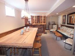 Finished Basement With Rustic Table And Chairs Rustic Table And Chairs Rustic Table Finishing Basement