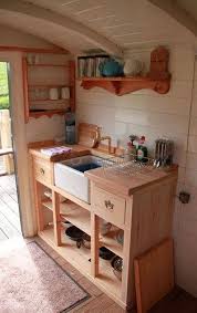Incorporating shelving into your tiny house kitchen is a must. Keukentje Compact Kitchen Add A Hot Plate And Done Tiny House Kitchen Kitchen Design Small Tiny House Living