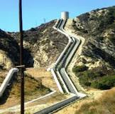 Image result for how water is brought over the coastal range into Los Angeles from the canal
