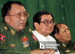 Image of Burmese Foreign Minister Ohn Gyaw (C) is flanked by Minister