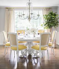 Another view of the dining room by designer candice olson. Yellow And Gray Dining Room Transitional Dining Room Farrow And Ball Cornforth White Domino Magazine