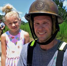 PIC OF THE DAY: Firefighting Dad Is Daughter's Hero