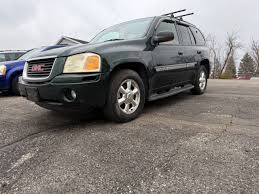 Image result for Medium Green 2003 Envoy