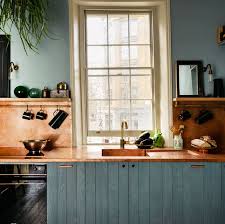 This Popular Kitchen Countertop Material Is Actually Made From Dripping Water In Caves In 2020 Rustic Kitchen Cabinets Rustic Kitchen Devol Kitchens