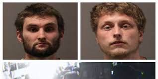 Whitman men charged with setting vehicles