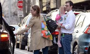 Chelsea clinton stands up for barron trump. Chelsea Clinton And Husband Marc Take The Kids Out In Nyc Daily Mail Online