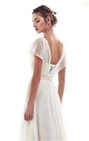If you're looking to cover up, go for a short wedding dress with longer sleeves. Lace Up Simple Short Sleeves A Line Vintage Wedding Dress Shedress Online Store Powered By Storenvy