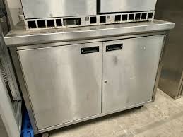 With the dark floor and the windows that receive natural light, it has gained a wider and more spacious appearance and has been a stylish kitchen design in general. Secondhand Catering Equipment Kitchen Cupboards And Cabinets