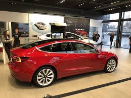 First Tesla Model 3 Reaches Uk For Display At The Park Royal Tesla Showroom In London Tesla Model Tesla Tesla Model X