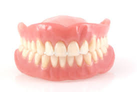 Dentures vs Dental Implants vs Dental Bridges in Weston, MA