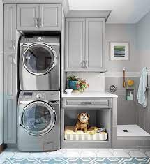 Laundry Room With Stacked Washer Dryer A Built In Dog Bed And A Dog Wash Rangement Buanderie Design Buanderie Diy Rangement Chambre