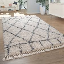 Saugen sie ihren teppich immer in florrichtung ab. Shaggy Wohnzimmer Teppich Rauten Creme Blau Teppichcenter24