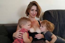Breast friends: Photo of babysitter mum who breastfeeds her son and his pal  goes viral | Irish Independent