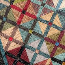 Earlier this year I started a sew along in my Facebook quilting group for  this quilt I made for my son last Christmas. I showed a picture here and  got so many