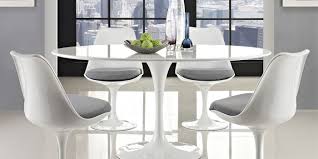 Mark, the owner of iconic interiors, demonstrates the eero saarinen style table. Saarinen 96 Oval Marble Tulip Dining Table Eero Saarinen Njmodern Furniture