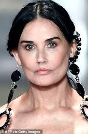But now demi moore is facing her most daunting opposition yet: Demi Moore S Face Appears Back To Normal In New Fendi Show Image After Sparking Plastic Surgery Daily Mail Online