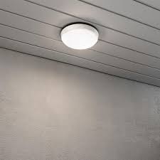 With a flushmount design, you're able to maximize the floor to ceiling height, making it perfect for outdoor areas, such as covered porches, garages or car ports. Cesena White Disk Ceiling Flush Porch Light Ideas4lighting Sku27171i4l