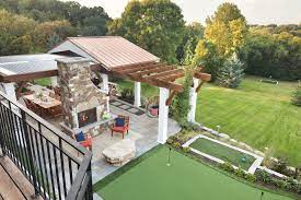 Mom's Design Build-| Backyard Golf Green And Bar With A Pavilion And  Masonry Oven