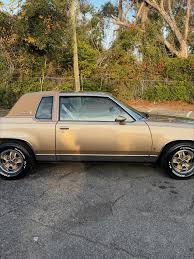 Image result for Light Driftwood 1987 Oldsmobile