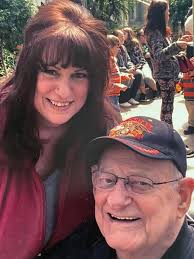 Any information about the person leading the procession?