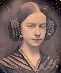 Austrian girl with cropped hair 1870s.