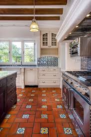 The rest of this kitchen's color palette uses earth tones, which is also a hallmark of spanish hacienda style. Try A Spanish Style Kitchen Here Are Some Amazing Decor Ideas