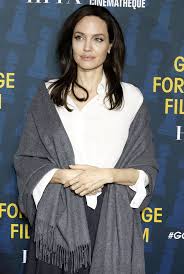 The actress claims her late mother. Angelina Jolie Underwhelms In Atelier Versace At Golden Globe Awards