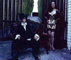 Dita von teese and marilyn manson photographed by steven klein vogue march 2006 von teese and manson s gothic style wedding in 2005 was well documented by vogue in the march 2006 issue. Dita And Manson Vogue Wedding Photoshoot Dita Von Teese Marilyn Manson Marilyn Manson Art