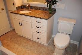 New caledonia granite with espresso cabinets. Maple Marshmallow Cream Cabinets Caledonia Granite Vinyl Floors Traditional Bathroom Other By Hatchett Design Remodel Houzz Uk