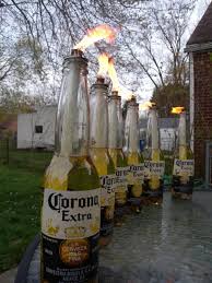 Finding Bibelots Tiki Torches Tiki Torches Backyard Party Decorations Beer Bottle Crafts