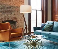 This extraordinary pair of lounge chairs are an excellent examples quinet's midcentury output, and feature strapped backs, metal sabots, and lush, newly. Carlo Midcentury Modern Design Sofa And Chair From West Elm Nice