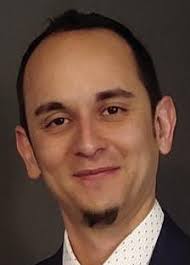 ERIC “E.T.” REMINGTON THOMAS